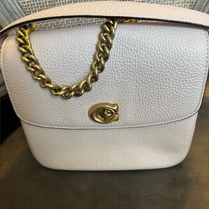 Coach Cassie Crossbody Leather Handbag. in Blush pink color